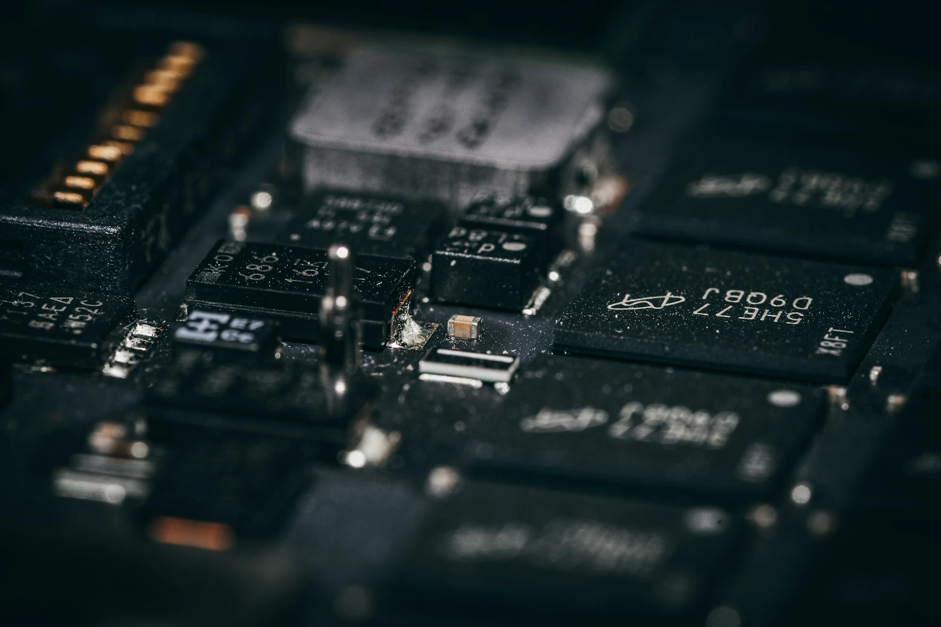 Close-up of a complex electronic circuit board with many components.